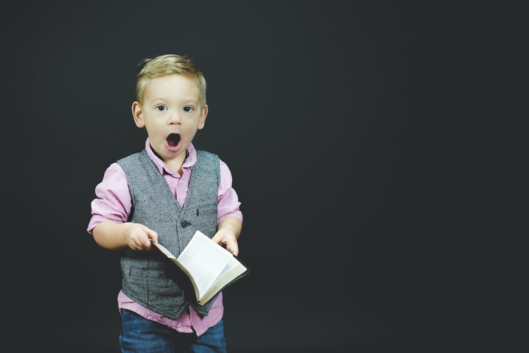 Little boy with mouth open in surprise